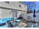 Private patio with seating and outdoor furniture at 11231 Heritage Green Dr, Cornelius, NC 28031