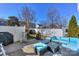 Patio with seating, fire pit, and grill at 11231 Heritage Green Dr, Cornelius, NC 28031