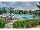 Community swimming pool with plenty of deck space at 11231 Heritage Green Dr, Cornelius, NC 28031