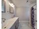 Updated bathroom with double vanity and a large shower at 114 W Lee Ave, Bessemer City, NC 28016