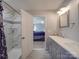 Modern bathroom with marble shower and double vanity at 114 W Lee Ave, Bessemer City, NC 28016