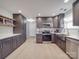 Modern kitchen with stainless steel appliances and white countertops at 114 W Lee Ave, Bessemer City, NC 28016