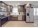 Updated kitchen featuring stainless steel appliances and light wood flooring at 114 W Lee Ave, Bessemer City, NC 28016