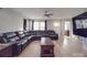 Spacious living room with sectional sofa, coffee table, and hardwood floors at 114 W Lee Ave, Bessemer City, NC 28016