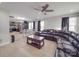 Open living room and kitchen with hardwood floors and sectional sofa at 114 W Lee Ave, Bessemer City, NC 28016