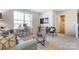 Versatile bonus room with a sitting area and built in shelving at 1467 Honey Trl, Monroe, NC 28112