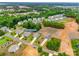 Aerial view of a neighborhood showcasing the home's location at 15298 Windward Ln among tree-lined streets at 15298 Windward Ln, Lancaster, SC 29720