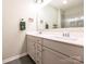 Double vanity bathroom with modern fixtures and large mirror at 15298 Windward Ln, Lancaster, SC 29720
