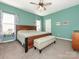 Bright bedroom with wood bed frame and neutral decor at 15298 Windward Ln, Lancaster, SC 29720