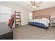 Bright bedroom featuring a comfortable king-size bed and ample natural light at 15298 Windward Ln, Lancaster, SC 29720