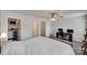 Spacious bedroom with a bed, walk-in closet, and desk, offering ample storage at 15298 Windward Ln, Lancaster, SC 29720