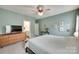 Serene bedroom with a dresser, calming wall art, and neutral decor at 15298 Windward Ln, Lancaster, SC 29720