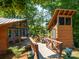 Two cozy cabins with a connecting deck overlooking a lake at 15298 Windward Ln, Lancaster, SC 29720