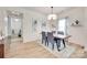 Bright dining room with an open layout, flowing into the kitchen and providing an airy atmosphere at 15298 Windward Ln, Lancaster, SC 29720