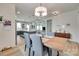 Elegant dining room area with open floor plan, seamlessly connecting to the stylish kitchen and living area at 15298 Windward Ln, Lancaster, SC 29720