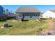House exterior with gray-blue siding and backyard view at 15298 Windward Ln, Lancaster, SC 29720