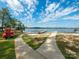 Paved paths and kayak storage by the lake at 15298 Windward Ln, Lancaster, SC 29720