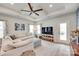 Bright living room with a large TV and comfortable sectional sofa at 15298 Windward Ln, Lancaster, SC 29720