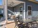 Covered patio with outdoor furniture, perfect for relaxing at 15298 Windward Ln, Lancaster, SC 29720