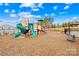Well-maintained community playground featuring slides, swings, and climbing structures for entertainment at 15298 Windward Ln, Lancaster, SC 29720