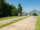 Two shuffleboard courts in a grassy area with homes in the background at 15298 Windward Ln, Lancaster, SC 29720