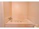 Bathroom featuring a built-in whirlpool bathtub at 1602 Eaves Rd, Shelby, NC 28152