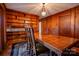 Wood-paneled dining room with built-in shelving at 1602 Eaves Rd, Shelby, NC 28152