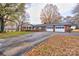 Ranch house with a long driveway and autumn leaves at 1602 Eaves Rd, Shelby, NC 28152