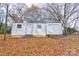 White storage shed with double doors and ramp access at 1602 Eaves Rd, Shelby, NC 28152
