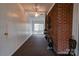 Sunroom with brick wall and sliding glass doors at 1602 Eaves Rd, Shelby, NC 28152