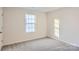 Bright bedroom with carpet flooring and large window at 1717 Wooten Way, Bessemer City, NC 28016