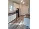 Modern kitchen with stainless steel appliances and granite countertops at 1827 Mcdonald St, Charlotte, NC 28216