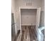 Laundry room with white doors and wire shelving at 1827 Mcdonald St, Charlotte, NC 28216