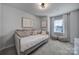 Cozy bedroom with a daybed and neutral color scheme at 193 Audra Faye Ln, Indian Trail, NC 28079