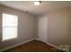 Bedroom with a window, neutral walls, and wood-look floors at 2029 Shady Pond Dr, Clover, SC 29710