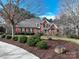 Brick house with manicured landscaping and driveway at 272 Porters Glen Ln, New London, NC 28127