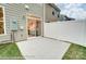 Private backyard patio with sliding glass door access at 4268 Black Ct # 229, Harrisburg, NC 28075