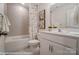 Bathroom with shower/tub combo, vanity, and decorative art at 4268 Black Ct # 229, Harrisburg, NC 28075