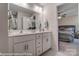Double vanity bathroom with a shower and view of bedroom at 4268 Black Ct # 229, Harrisburg, NC 28075