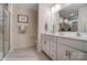 Double vanity bathroom with a large mirror and shower at 4268 Black Ct # 229, Harrisburg, NC 28075