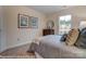Bedroom with a queen bed, large window, and dresser at 4268 Black Ct # 229, Harrisburg, NC 28075