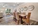 Bright dining area with wood table and chairs, offering a comfortable space for meals at 4268 Black Ct # 229, Harrisburg, NC 28075