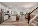 Open concept kitchen with island and stainless steel appliances at 4268 Black Ct # 229, Harrisburg, NC 28075