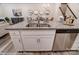 Modern kitchen island with granite countertops, double sink, and stainless steel appliances at 4268 Black Ct # 229, Harrisburg, NC 28075