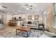 Open living room showcasing a kitchen island and comfortable seating area at 4268 Black Ct # 229, Harrisburg, NC 28075