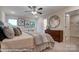 Bright bedroom with large bed and walk in closet at 4268 Black Ct # 229, Harrisburg, NC 28075