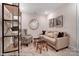 Charming sitting area with a couch and built in shelving at 4268 Black Ct # 229, Harrisburg, NC 28075