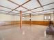 Finished basement recreation room with wood paneled walls and neutral flooring at 4333 Tipperary Pl, Charlotte, NC 28215