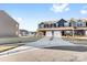 Townhome with gray siding, two-car garage, and driveway, in a residential neighborhood at 543 San Marco Dr # 16, Gastonia, NC 28056