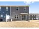 Townhouse exterior with sliding glass door at 543 San Marco Dr # 16, Gastonia, NC 28056